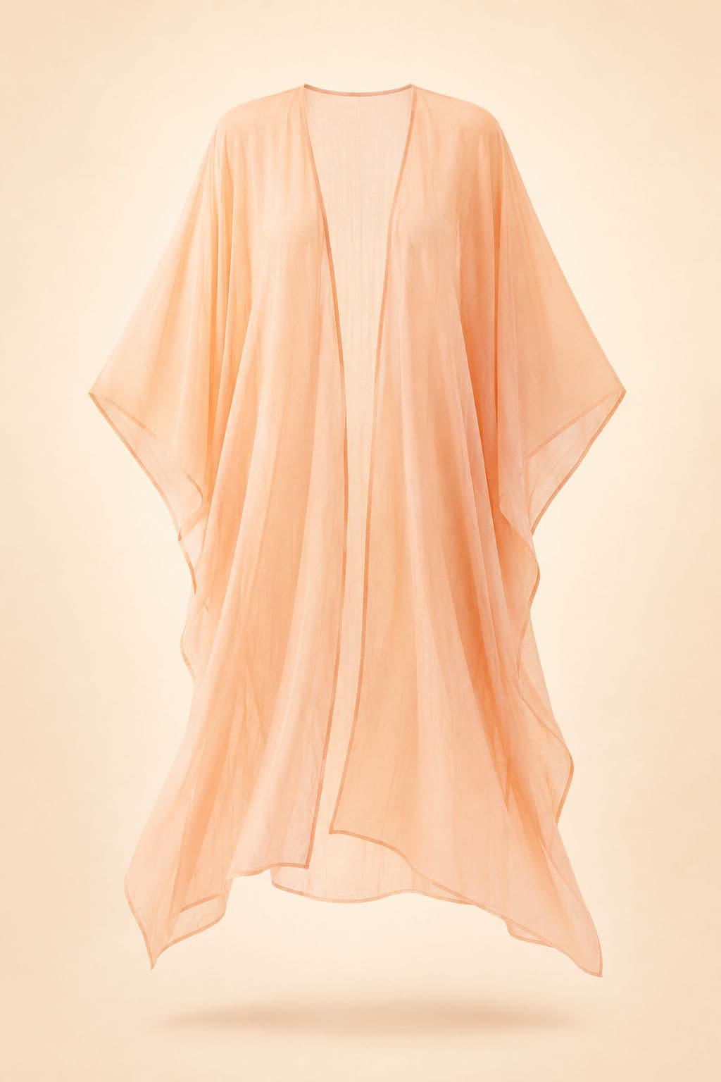 Kaftan Cover-Up — Sheer cotton voile, cut wide. This is a layer, not a dress worn on its own.