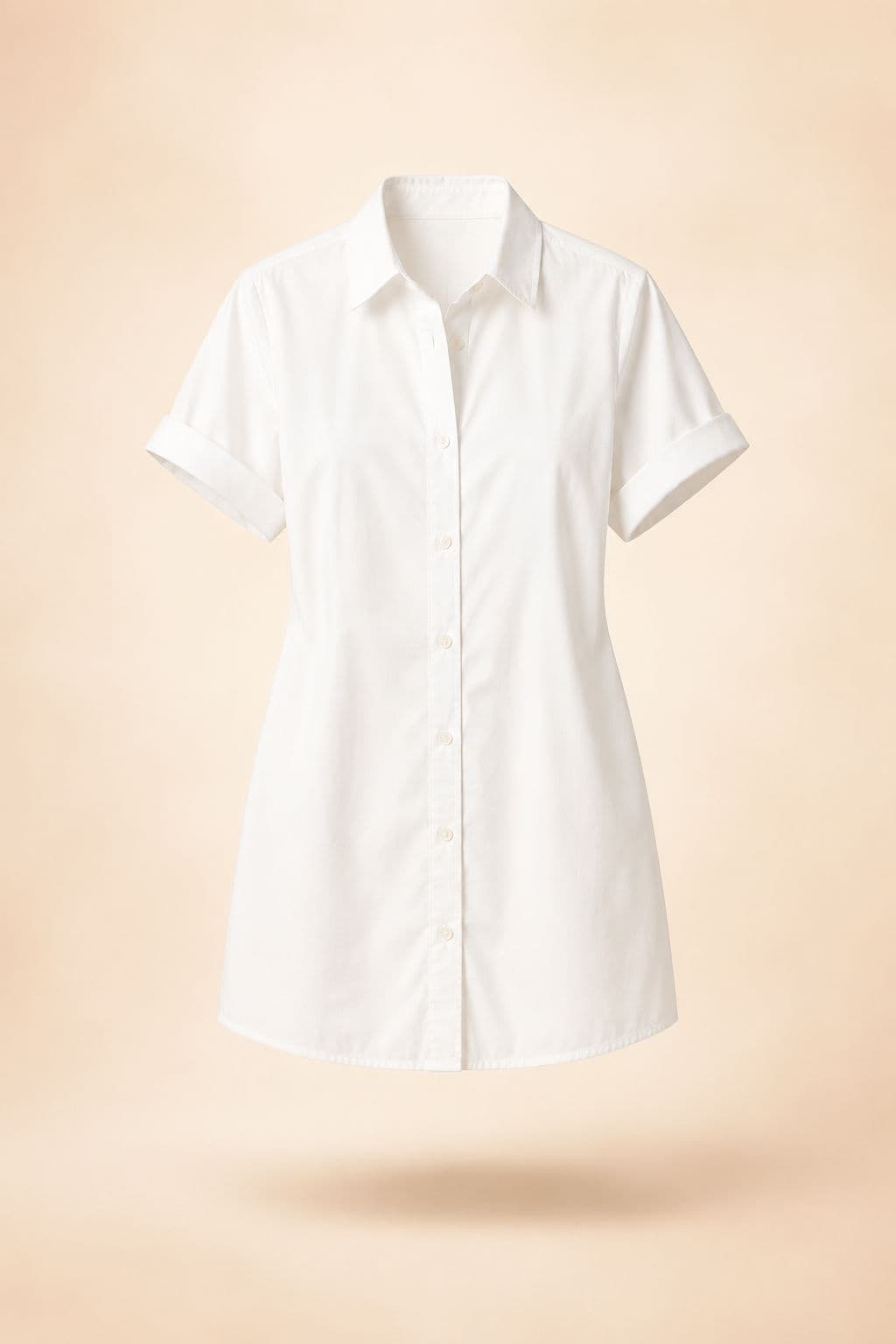 Poplin Shirt Dress Short — Crisp cotton poplin, above the knee, with a hem that rises when you sit.