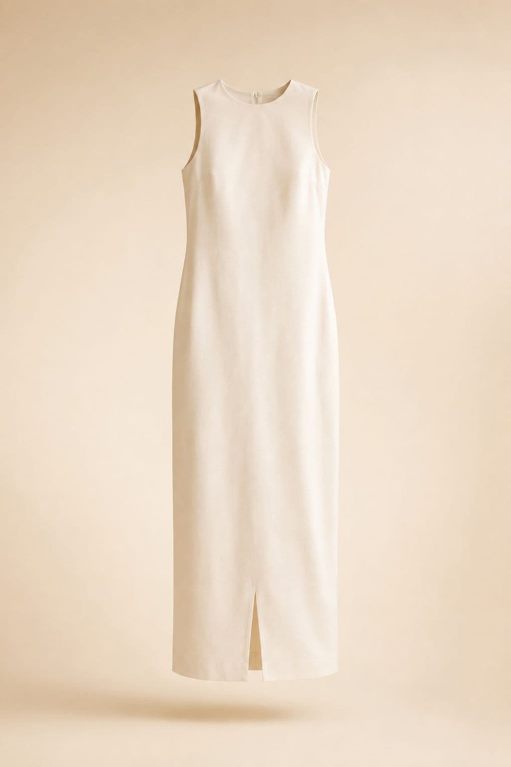 Sleeveless Column Maxi — A straight column in double-faced cotton sateen, fully lined, with a 34 cm back vent.