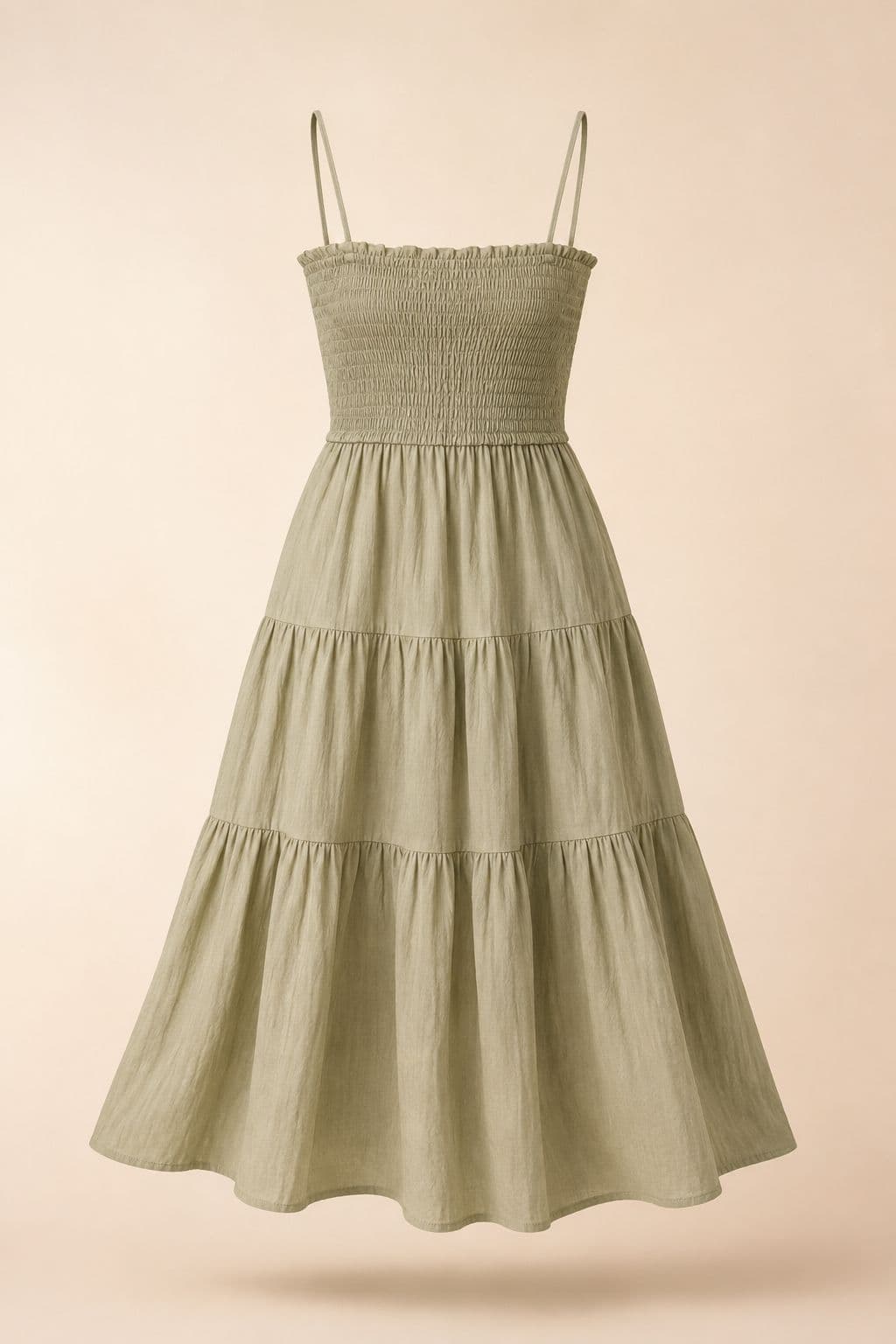 Smocked Bodice Midi — A smocked stretch bodice with a published relaxed-to-stretched range, over a tiered skirt.