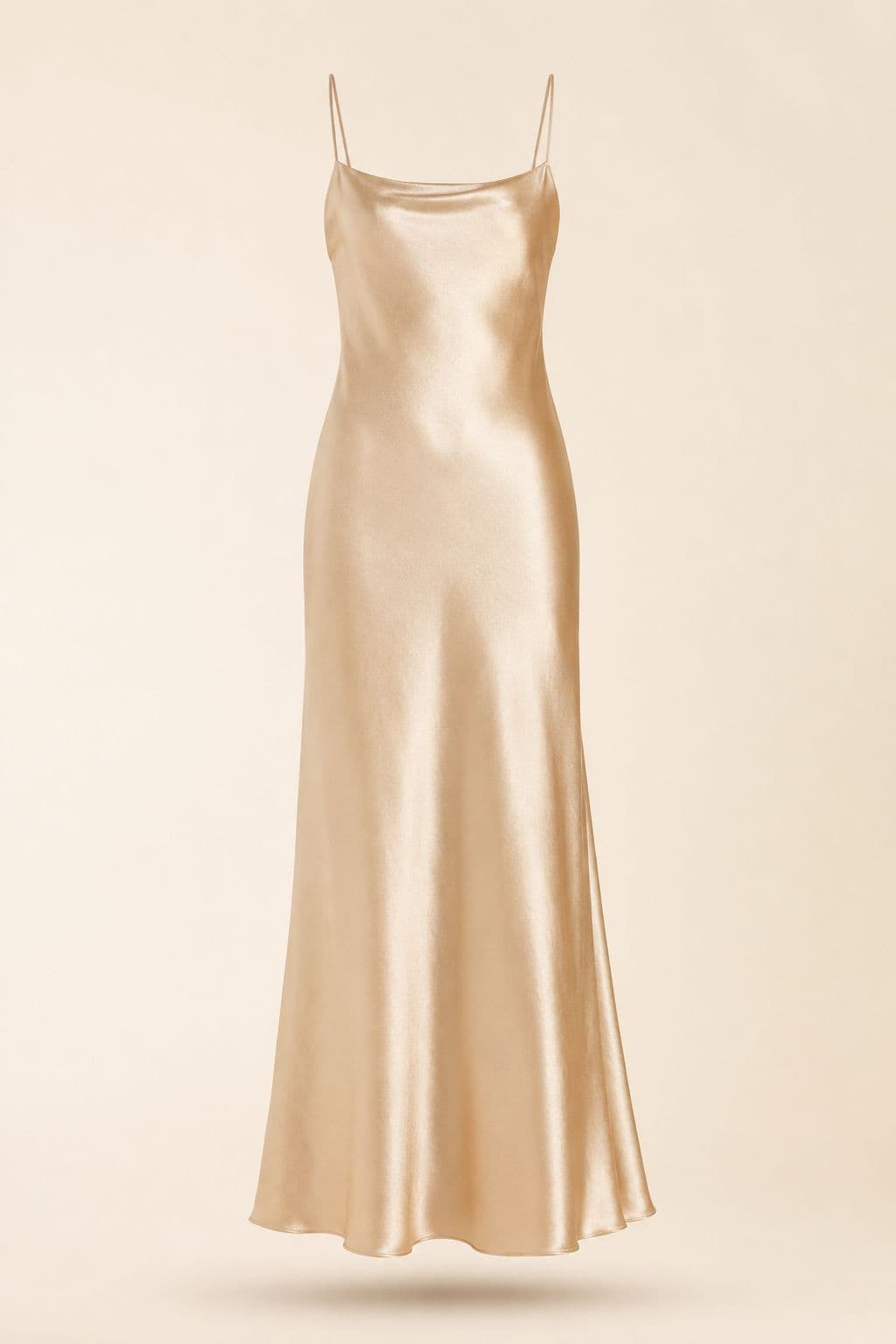 Satin Slip Maxi — A bias satin slip in champagne. Opaque, unlined, and it records every mark.